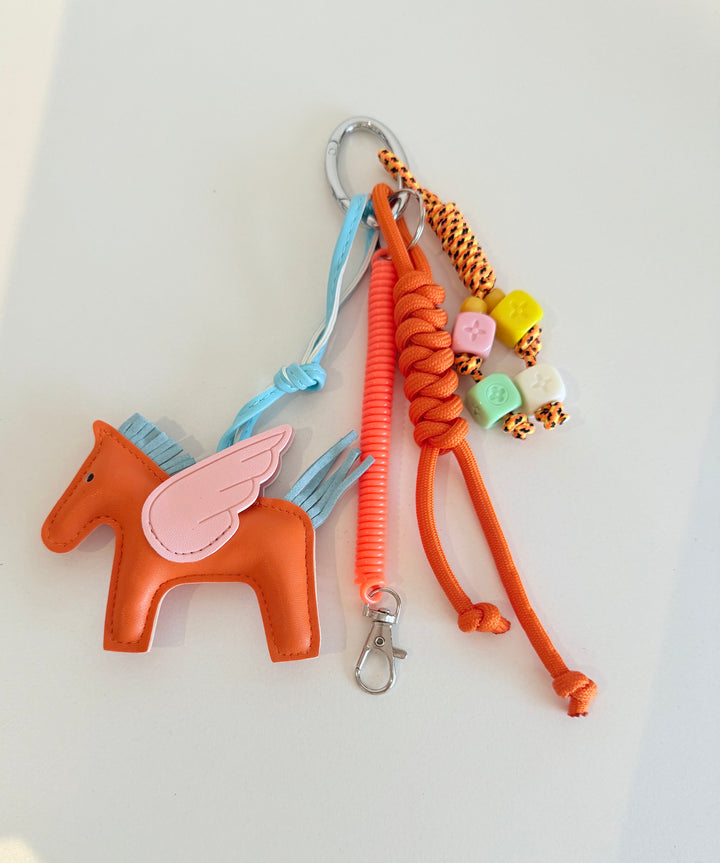 Porte-clés / Bijou de sac Pégase Pop orange